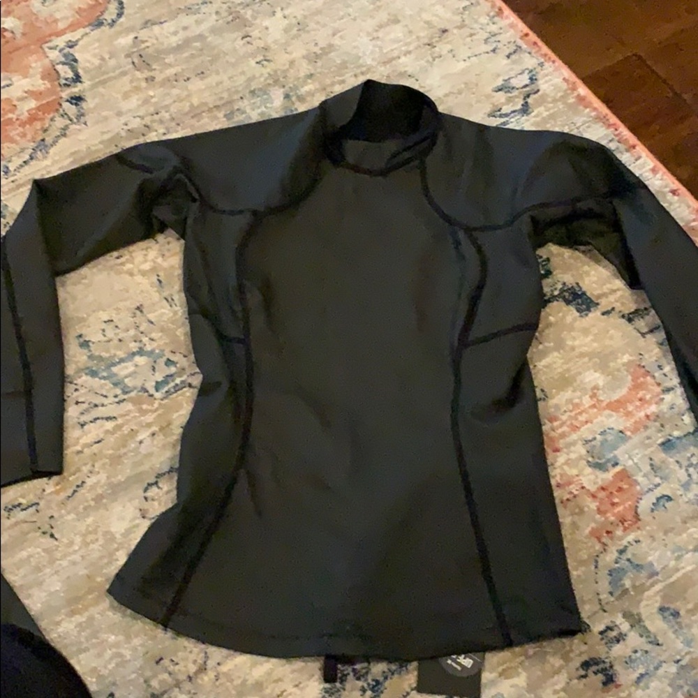 Hurley advantage plus  .05 mm wind skin black